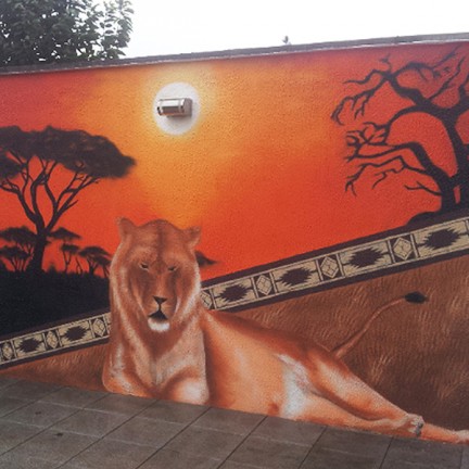 Farbwandel Fassadenkunst Garagenwand